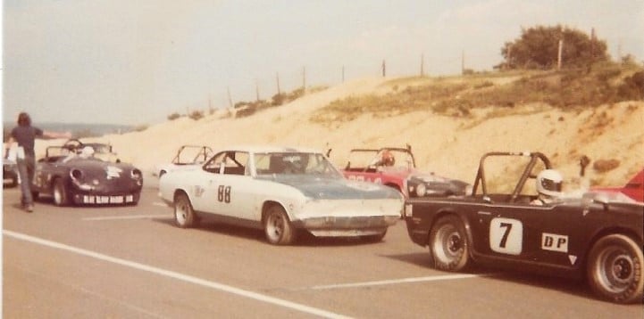 Preparing to go on track at Bridgehampton in 1976 in his Yenko Stinger, along with an Alfa Giulietta, a Renault 8 Gordini, Peconic Sound.