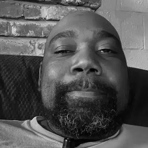 black and white headshot of Antonio Tolliver